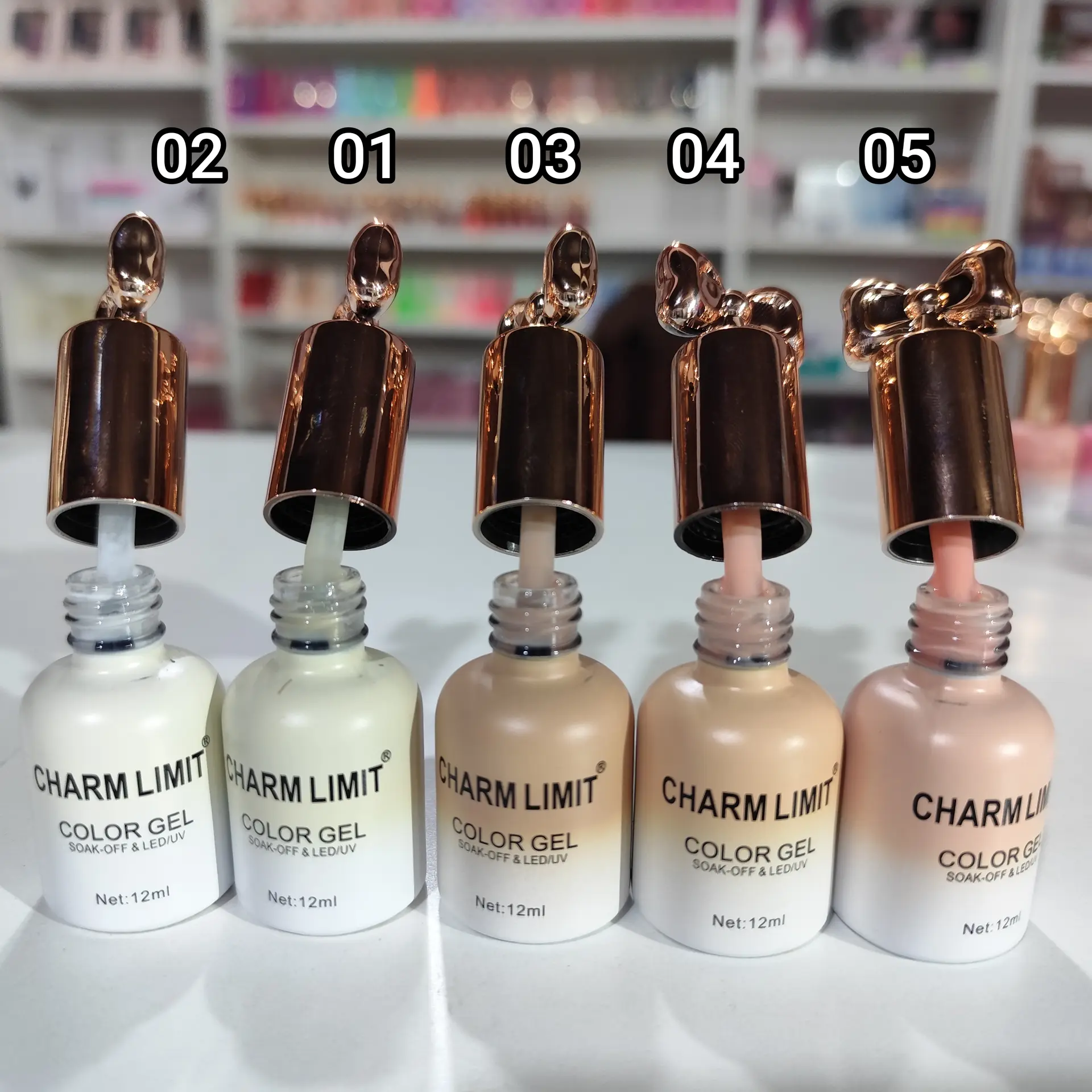 Esmalte de moño Charm limit de tapa dorada 12ml